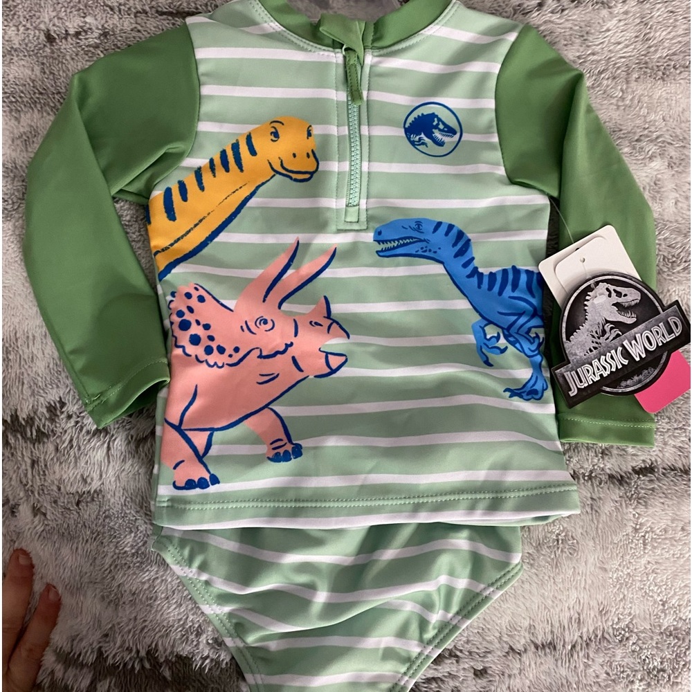 Jurassic World Infant Swimsuit, 12M polyester spandex blend. Machine washable.